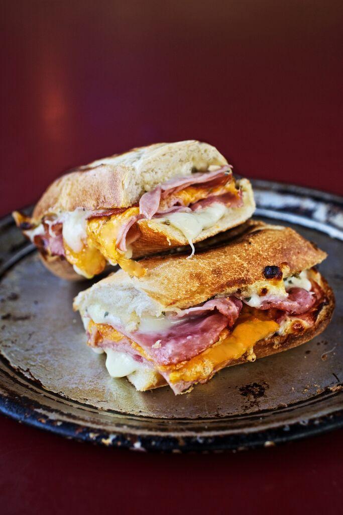 Ham and Cheese Sandwich · Smoked ham layered with white American and cheddar cheese. Served up toasty on a Tuscan baguette.