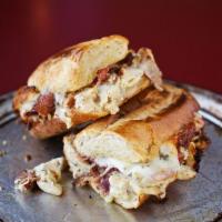 Cordon Bleu Sandwich · Grilled chicken breast, smoked ham crispy bacon, Alfredo sauce and white American cheese. Se...