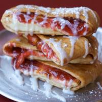 Cherry Strudel · Cherry filling wrapped in our hand-tossed original crust with cinnamon, sugar, and icing. 