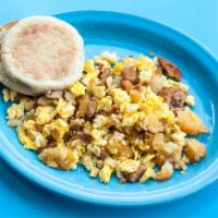 Delicious Scramble Breakfast · 3 scrambled eggs with hash browns.
