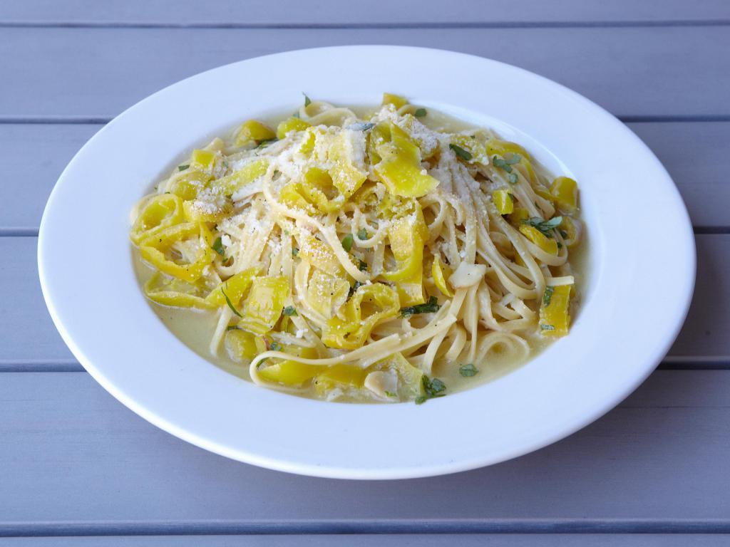 Spaghetti Aioli Olio · Sauteed garlic, olive oil, and hot banana peppers.