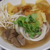 N1. Beef Noodle Soup · Beef noodle soup with bean sprout, onion, scallion, meatballs and fried wonton.