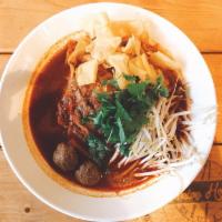 N2. Mongolian Warrior Soup · Hot and spicy Vietnamese beef noodle soup with bean sprout, onion, scallion, meatballs and f...