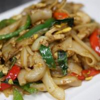 SN11. Drunken Noodles · Stir-fried flat rice noodles with basil, bell pepper, onion, and egg in spicy basil sauce. M...