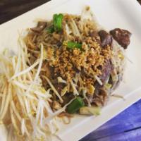 SN15. Pad Thai Noodle · Famous Thai noodles with bean sprout, scallion and egg, topped with ground peanut.
