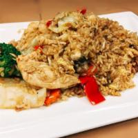 F8. Teriyaki Fried Rice · Stir-fried rice with mushroom, broccoli, carrot, onion, cabbage, red pepper and egg in teriy...