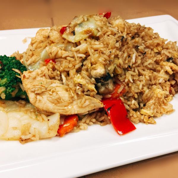 F8. Teriyaki Fried Rice · Stir-fried rice with mushroom, broccoli, carrot, onion, cabbage, red pepper and egg in teriyaki sauce.