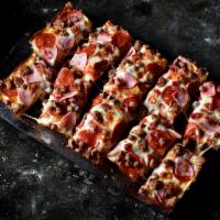 Party Tray All Meaty Pizza · Premium mozzarella, pepperoni, ham, bacon, Italian sausage and hamburger. 30 pieces deep dish.