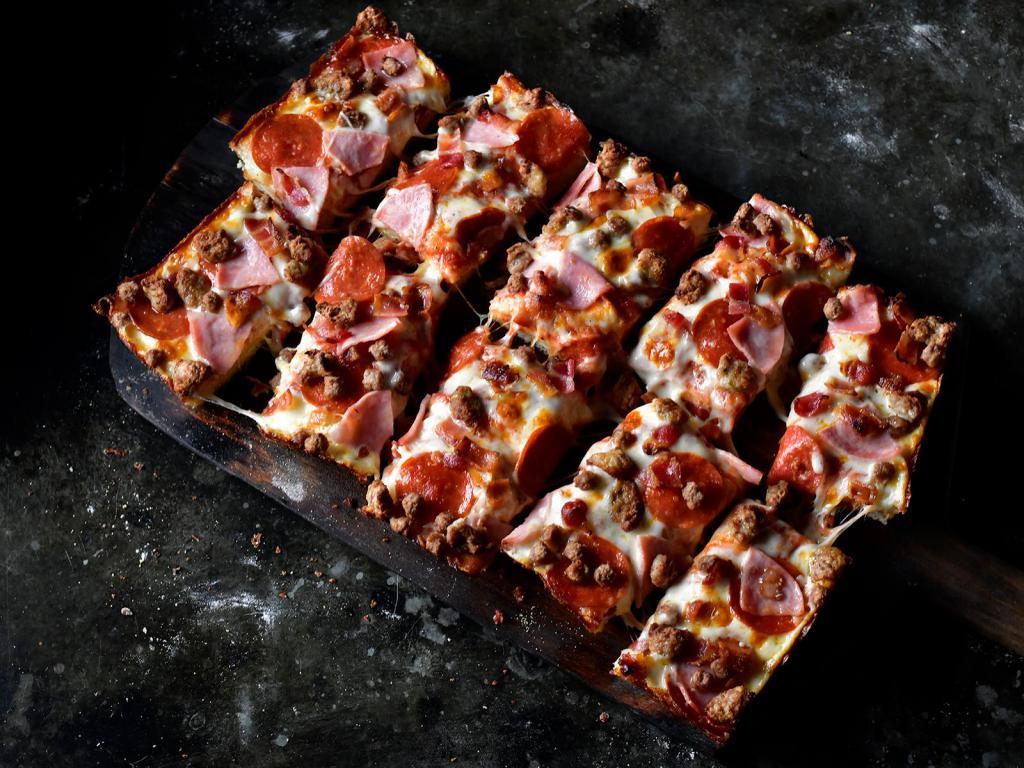 8 Corner All Meaty Pizza · Premium mozzarella, pepperoni, ham, bacon, Italian sausage and hamburger. 8 pieces deep dish.