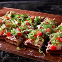 BLT Pizza · Premium mozzarella, bacon, lettuce, tomatoes and mayo.