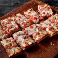 Gluten Free Chicken Parmesan Pizza · Premium mozzarella, grilled chicken, tomatoes, buttered crust and shredded Parmesan. 6 piece...