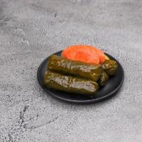 Gluten Free Dolma · Grape leaves stuffed with rice, pine nuts, onions, black currants and Mediterranean spices.