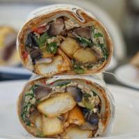 Egg White Breakfast Burrito · Egg whites, spinach, bell peppers, mushrooms, onions, hash brown, Swiss cheese, fire roasted...