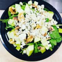 Cuzzo's Special Salad · Baby spinach and diced apples topped off with roasted walnuts and blue cheese, served with b...