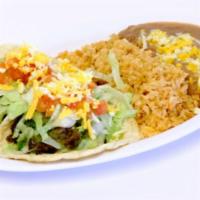 Taco Combo Plate · Served with rice, beans . tacos are corn tortilla . gluten free