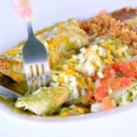 Enchiladas Combo Plate · Served with rice, beans and corn tortillas.