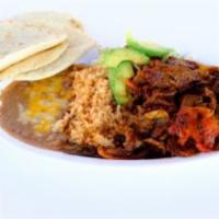 Steak Picado Combo Plate · Steak cooked with tomates, grilled onions, salsa and salad. Served with rice, beans and corn...