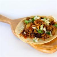 Regular Taco · Your choice of meat, onions, cilantro and salsa.