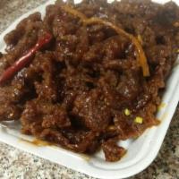 Orange Beef · Served with steamed rice.