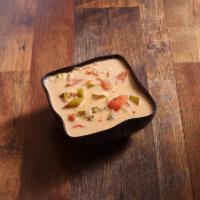 Tom Kha Coconut Soup · Mushrooms and your choice of meat cooked in Thai spices, coconut milk and lemongrass. Hot an...