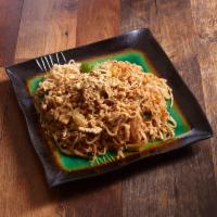 Authentic Traditional Phad Thai · Stir-fried thin noodle with tamarind sauce, eggs, onion, fish sauce and bean sprout and topp...