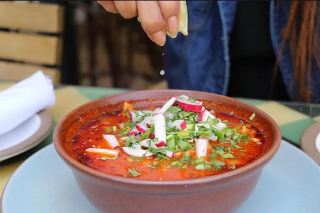 Pozole · Hominy, cilantro, onion, jalapeno, lime, and tostadas. Served with a choice of chicken or pork stew.