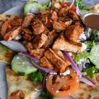 Aphrodisiac Greek Chicken Salad · Fresh marinated chicken, romaine lettuce, red onions, feta cheese, Kalamata olives, cucumber...