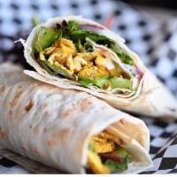 Italian Chicken Wrap · Served hot. Grilled chicken with spring mix, sun-dried tomato paste, red onion, tomato, prov...