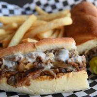 Philly Cheesesteak Sandwich · Thin slices of steak, grilled onions, mushrooms and melted cheese.