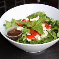 Caprese Salad · Iceberg lettuce, Fresh mozzarella, tomatoes, basil, extra virgin olive oil and balsamic vina...