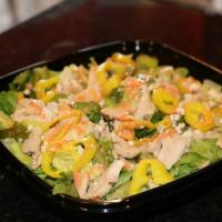 Buffalo Chicken Salad · Iceberg lettuce, Chicken with buffalo sauce, blue cheese crumbles, banana peppers and blue c...