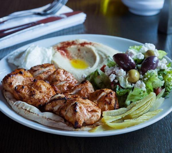 Chicken Tawook · Chicken breast, garlic sauce, wild cucumber pickles. Served with pita bread + your choice of one dip & one salad - hummus, spicy hummus, baba ghannouj | open sesame salad, fattoush, tabouleh
