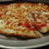 Roasted Red Pepper with Goat Cheese Pizza · Brushed with olive oil topped with sliced onions, roasted red peppers and mozzarella and goa...