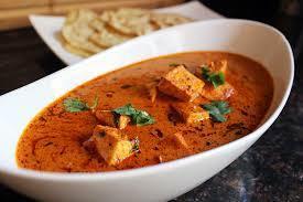 Paneer Tikka Masala · Indian cheese cubes cooked with onions and peppers in a creamy tomato sauce with a hint of f...