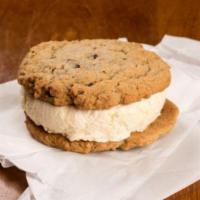 Ice Cream Sandwich · Hand scooped vanilla ice cream, sandwiched between two freshly baked oatmeal chocolate chip ...