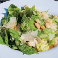 Caesar Salad · Crisp romaine lettuce hearts, toasted garlic croutons and hand-shaved Parmesan cheese with a...