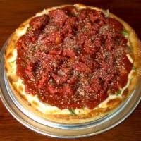 Chicago Deep Dish Pizza · Savory pie with a dough base topped with sauce and cheese.