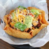 Taco Salad · Delicious salad made in a crunchy taco bowl. (not gluten free) We us only the freshest ingre...