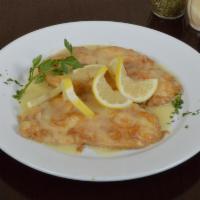 Chicken Francese · Chicken cutlets egged and sauteed in lemon white wine sauce and side pasta tomato sauce.