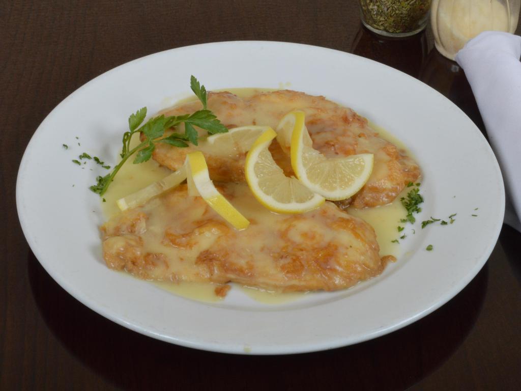 Chicken Francese · Chicken cutlets egged and sauteed in lemon white wine sauce and side pasta tomato sauce.