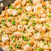 Chicken Fried Rice · Stir-fried rice with peas, corn, string bean, carrot, onion and egg and with chicken. Served...