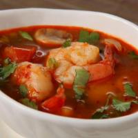 Tom Yum Soup · Spicy lemongrass soup with mushroom, tomato, cilantro and green onions.