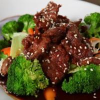 EN11. Chicken Teriyaki Entree · Chicken breast coated with homemade teriyaki sauce and served on a bed of  steamed veggies. ...