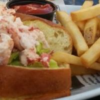 Lobster Roll (warm or cold) · Maine lobster salad or butter poached lobster on a toasted bun. Please specify choice.