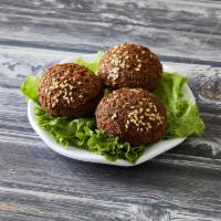 Stuffed Falafel (3 piece) · Falafels stuffed with minced fried onions and sumac (spicy)