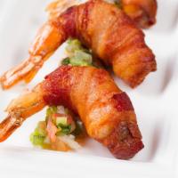 4 Shrimp Diablo · Bacon wrapped shrimp stuffed with cheese and jalapeno.