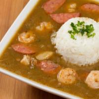 Gumbo · Made with chicken, sausage and shrimp.