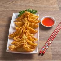 5. Crab Rangoon · 8 pieces. Fried wonton wrapper filled with crab and cream cheese.