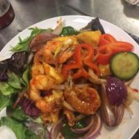 Pineapple Shrimp · Jumbo shrimp lightly battered and sauteed with fresh pineapple, bell pepper, onion in sweet ...