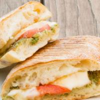 Caprese Sandwich · Housemade basil pesto, fresh mozzarella and tomatoes on ciabatta roll.